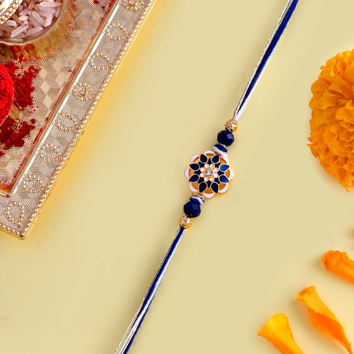 trueBrowns X Voylla Ethnic Studded Blue Thread Rakhi | Grocsy