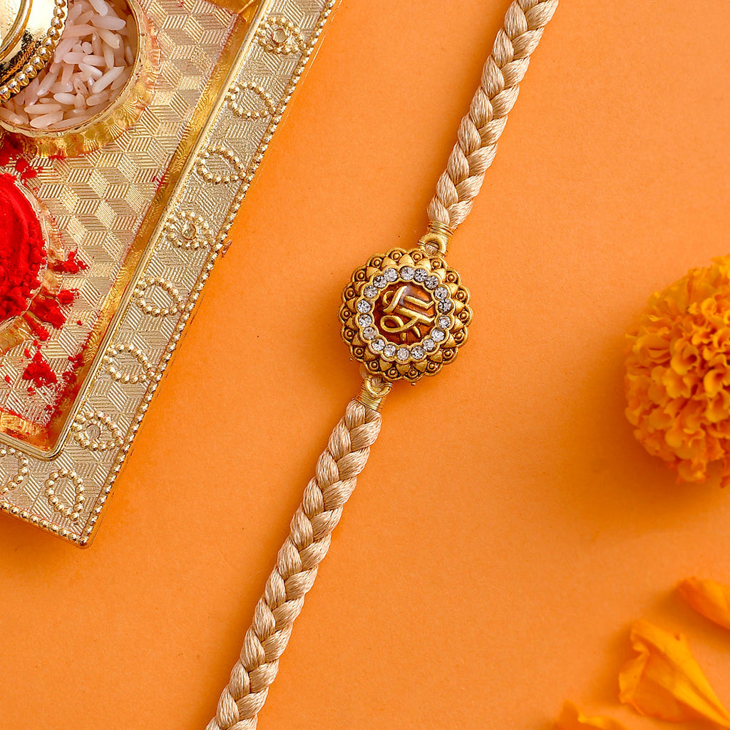 trueBrowns X Voylla Traditional Shree Inscription Zirconia Studded Rakhi | Grocsy