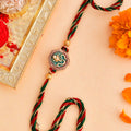 trueBrowns X Voylla Traditional Om And Lord Ganesha Motif Thread Rakhi | Grocsy