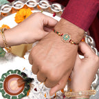 trueBrowns X Voylla Traditional Om And Lord Ganesha Motif Thread Rakhi | Grocsy