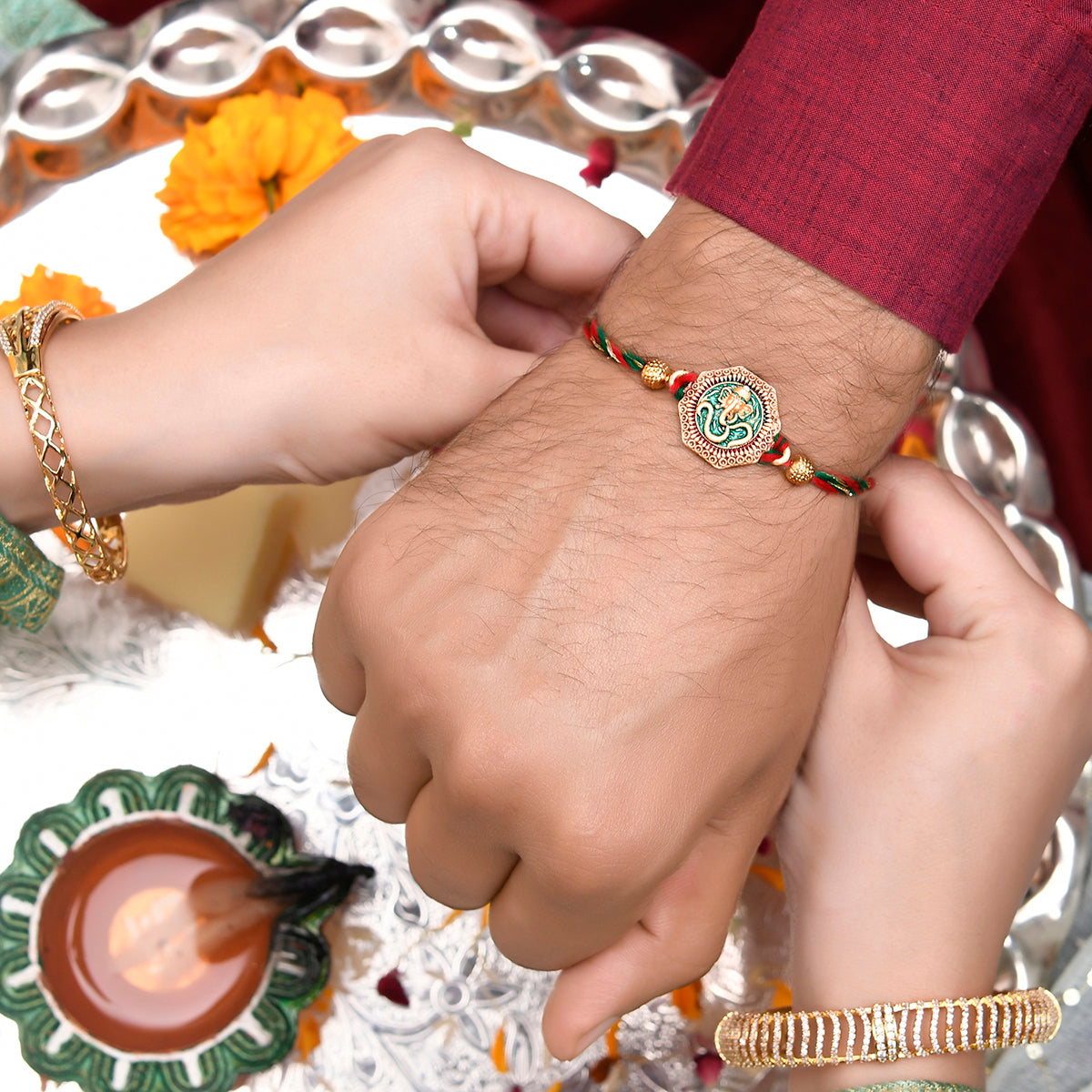 trueBrowns X Voylla Traditional Om And Lord Ganesha Motif Thread Rakhi | Grocsy