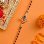 trueBrowns X Voylla Colorful Enameled Peacock Motif Beaded Thread Rakhi | Grocsy