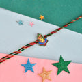 trueBrowns X Voylla Lord Ganesh Colourful Kids Thread Rakhi For Kids | Grocsy