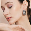 Silver Loops- Ruby Raang | Grocsy