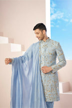 Majestic Blue Sherwani With Intricate Gold Crane And Floral Hand Embroidery. by Hilo Design | Grocsy
