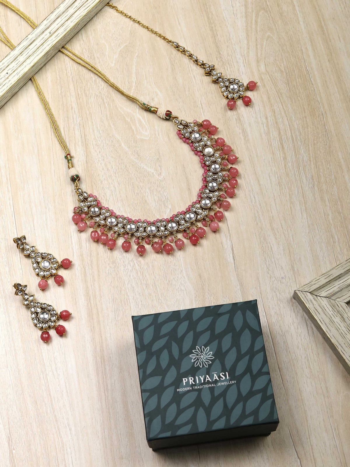Priyaasi Women Pink Beads Pearls Kundan Gold-Polished Jewellery Set with Maang Tikka - Swadesiicart