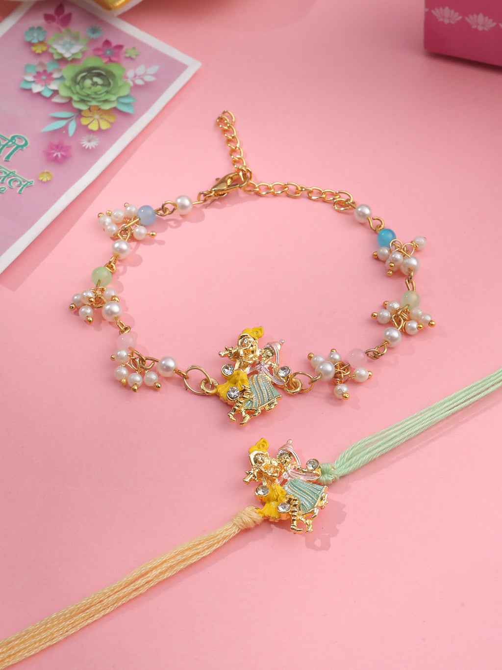 NVR Set of 2 Multicolor Gold Toned Radha Krishna Beaded Bhaiya Bhabhi Rakhi with Roli Chawal Chandan & Mishri | Grocsy