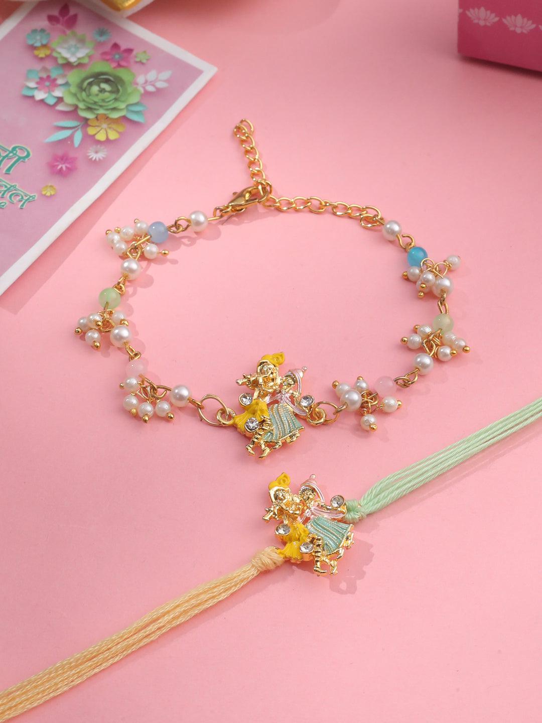 NVR Set of 2 Multicolor Gold Toned Radha Krishna Beaded Bhaiya Bhabhi Rakhi with Roli Chawal Chandan & Mishri | Grocsy