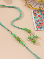 NVR Set of 2 Green Artificial Beads Bhaiya Bhabhi Rakhi with Roli Chawal Chandan & Mishri | Grocsy