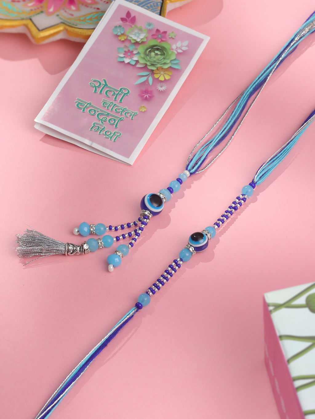 NVR Set of 2 Blue Evil Eye Artificial Beads Bhaiya Bhabhi Rakhi with Roli Chawal Chandan & Mishri | Grocsy