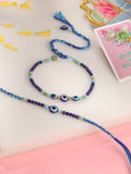 NVR Set of 2 Blue Evil Eye Artificial Beads Bhaiya Bhabhi Rakhi with Roli Chawal Chandan & Mishri | Grocsy
