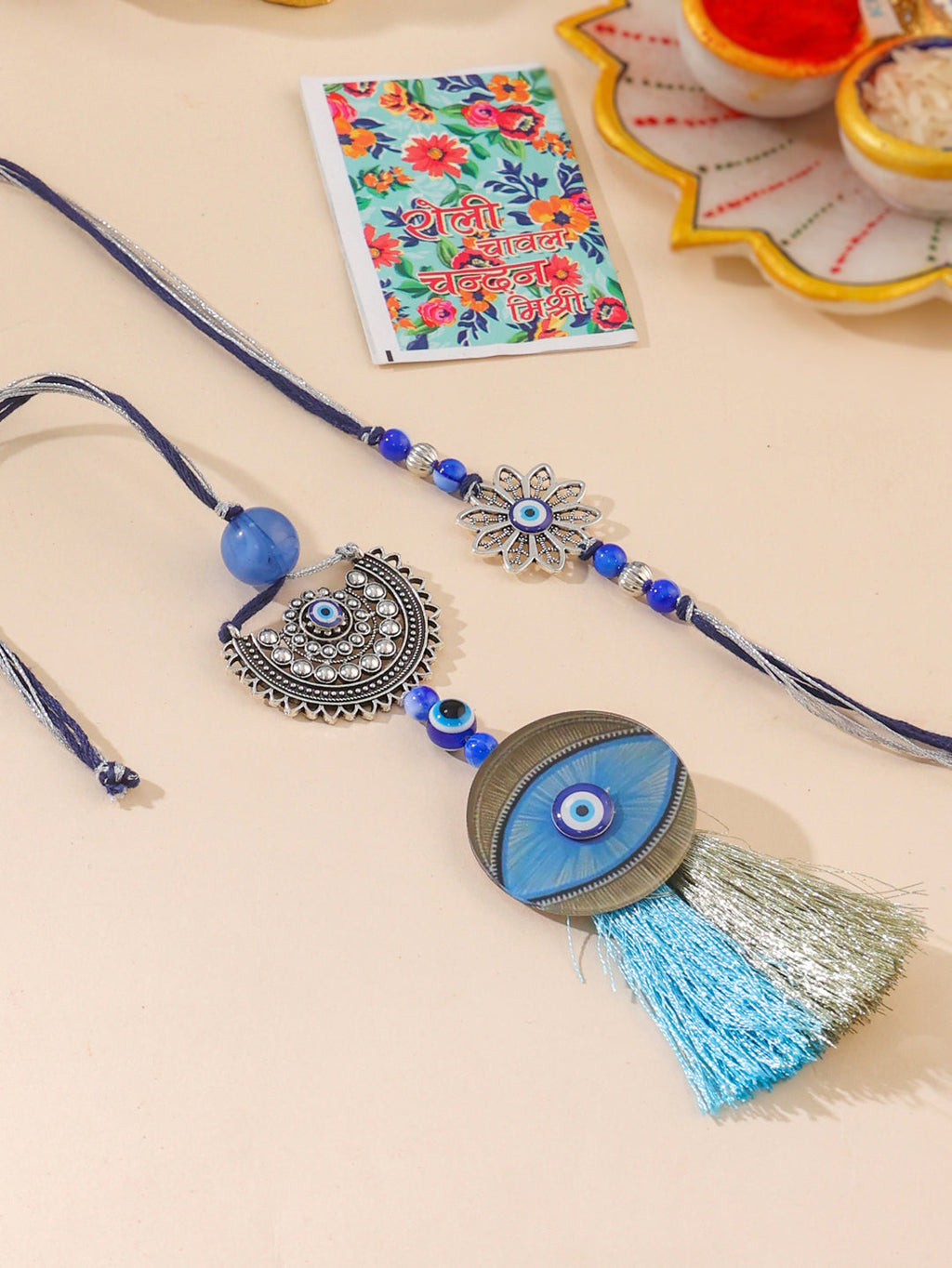 NVR Set of 2 Blue Evil Eye Artificial Beads Bhaiya Bhabhi Rakhi with Roli Chawal Chandan & Mishri | Grocsy