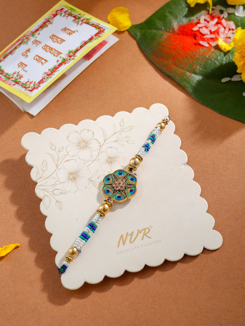 NVR Men Peacock Design Multicolor Artificial Stones & Pearls Thread Rakhi with Roli Chawal Chandan & Mishri | Grocsy