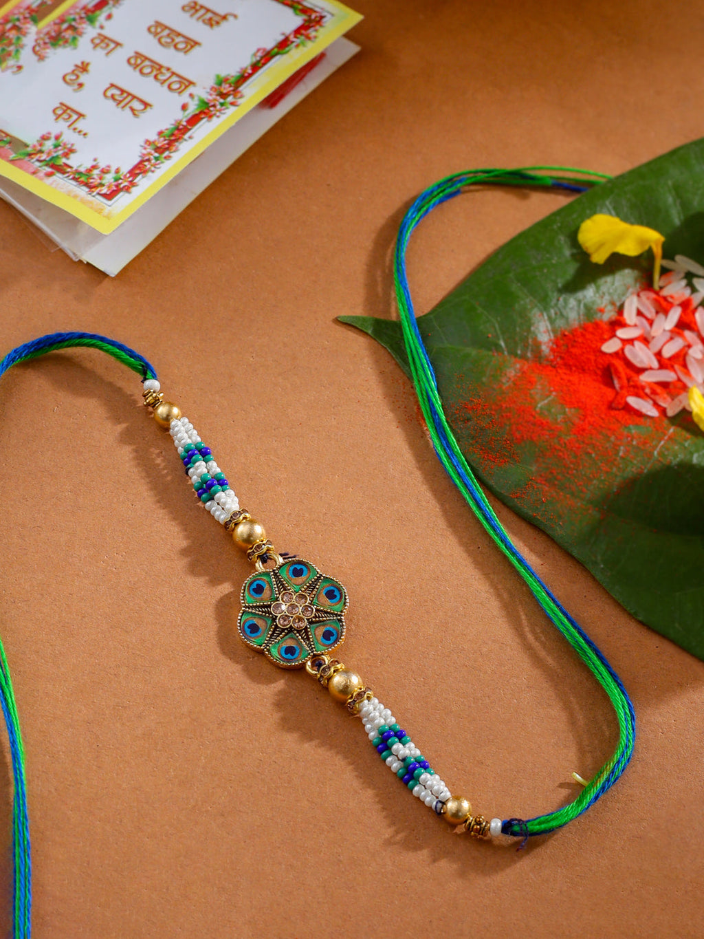 NVR Men Peacock Design Multicolor Artificial Stones & Pearls Thread Rakhi with Roli Chawal Chandan & Mishri | Grocsy