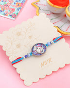 NVR Men Red & Blue Ganesh Ji Thread Rakhi with Roli Chawal Chandan & Mishri | Grocsy