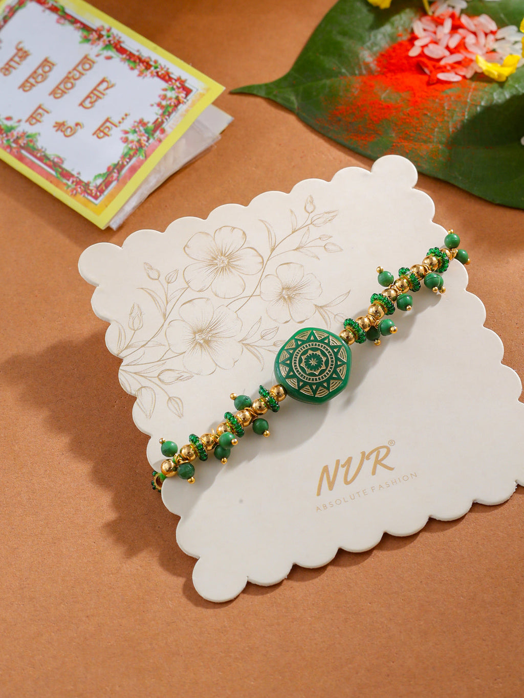 NVR Men Green Artificial Beads Round Shape Thread Rakhi with Roli Chawal Chandan & Mishri | Grocsy