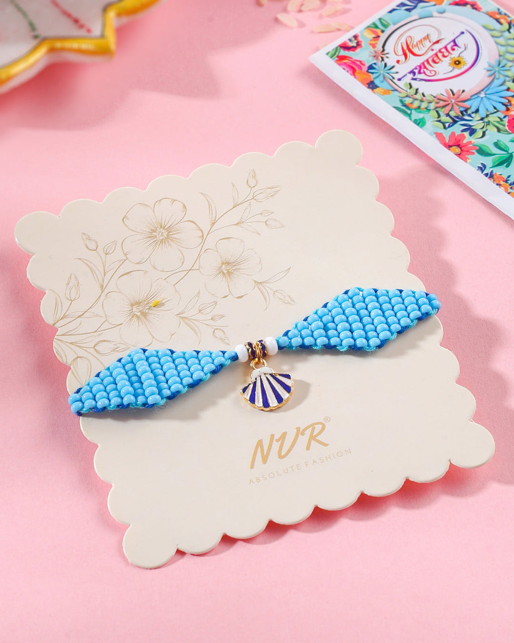 NVR Men Blue Pearls Unique Design Thread Rakhi with Roli Chawal Chandan & Mishri | Grocsy