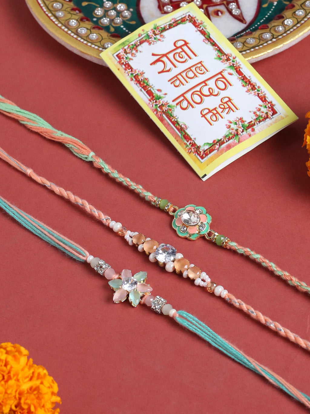 NVR Men Set of 3 Floral Design Multicolor Artificial Stones & Pearls Thread Rakhi with Roli Chawal Chandan & Mishri | Grocsy