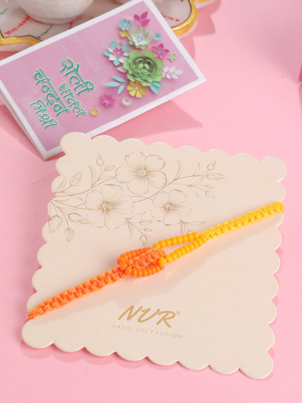 NVR Men's Multicolor Pearls Thread Rakhi with Roli Chawal Chandan & Mishri | Grocsy