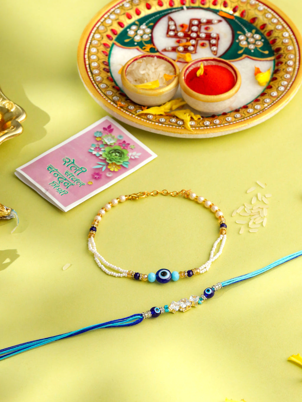 NVR Set of 2 Blue Evil Eye Artificial Stones & Beads Bhaiya Bhabhi Rakhi with Roli Chawal Chandan & Mishri | Grocsy