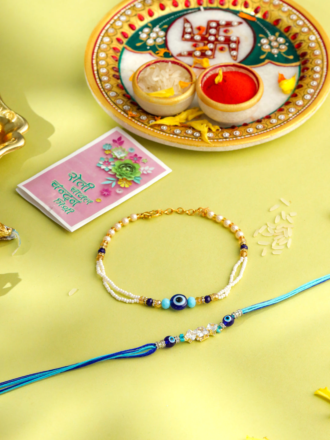 NVR Set of 2 Blue Evil Eye Artificial Stones & Beads Bhaiya Bhabhi Rakhi with Roli Chawal Chandan & Mishri | Grocsy