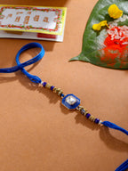 NVR Men Blue Artificial Stones Handmade Thread Rakhi with Roli Chawal Chandan & Mishri | Grocsy