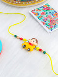 NVR Kids Yellow Cartoon Artificial Beads Rakhi with Roli Chawal Chandan & Mishri | Grocsy
