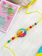 NVR Kids Multicolor Artificial Beads Rakhi with Roli Chawal Chandan & Mishri | Grocsy