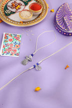 NVR Set of 2 Silver Toned Pearls & Beads Bhaiya Bhabhi Rakhi with Roli Chawal Chandan & Mishri | Grocsy