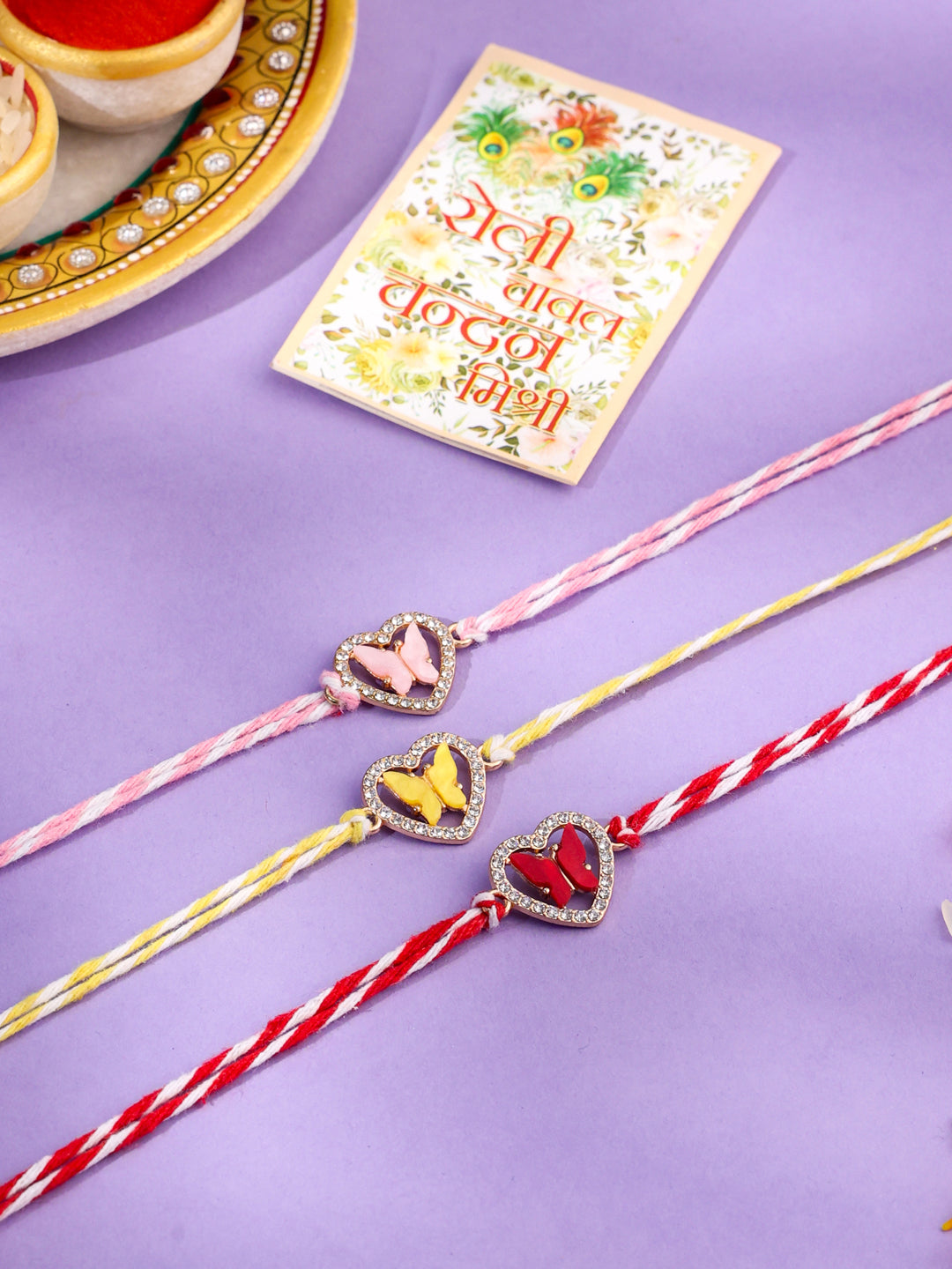 NVR Men Set of 3 Heart Shape Multicolor Artificial Stones Thread Rakhi with Roli Chawal Chandan & Mishri | Grocsy