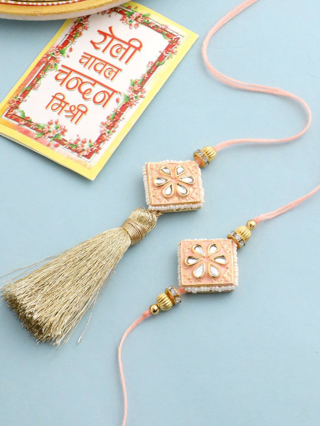 NVR Set of 2 Handmade Peach Kundan Studded Bhaiya Bhabhi Rakhi Set with Roli Chawal Chandan & Mishri | Grocsy