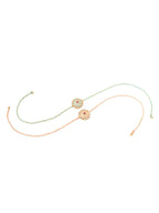 NVR Men Set of 2 Peach & Green Kundan Studded Round Floral Design Rakhi Combo | Grocsy