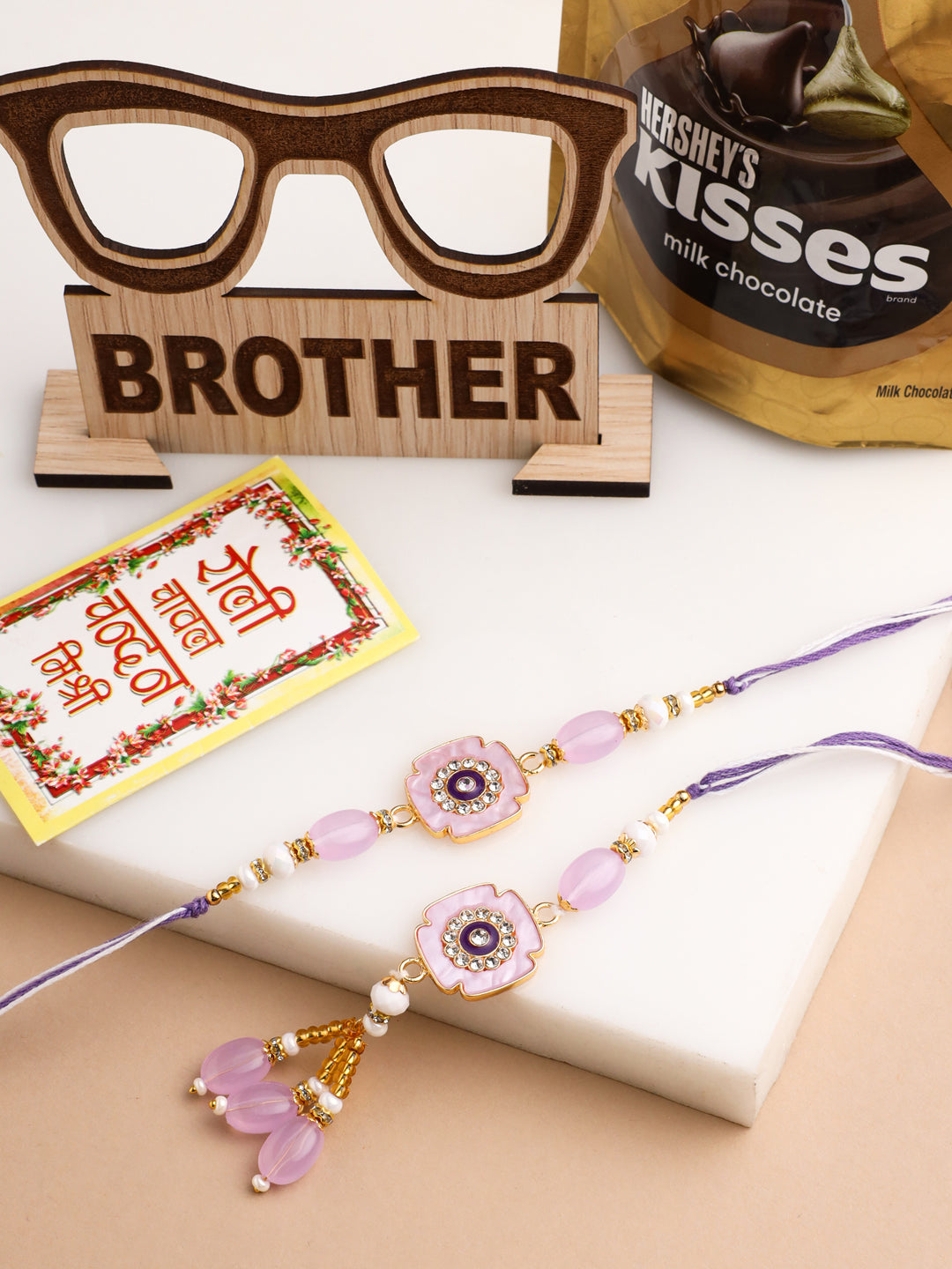 NVR Set of 2 Purple Artificial Stones & Beads Floral Design Thread Bhaiya Bhabhi Rakhi Combo | Grocsy