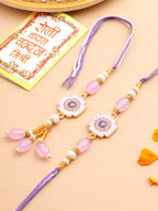 NVR Set of 2 Purple Artificial Stones & Beads Floral Design Thread Bhaiya Bhabhi Rakhi with Roli Chawal Chandan & Mishri | Grocsy