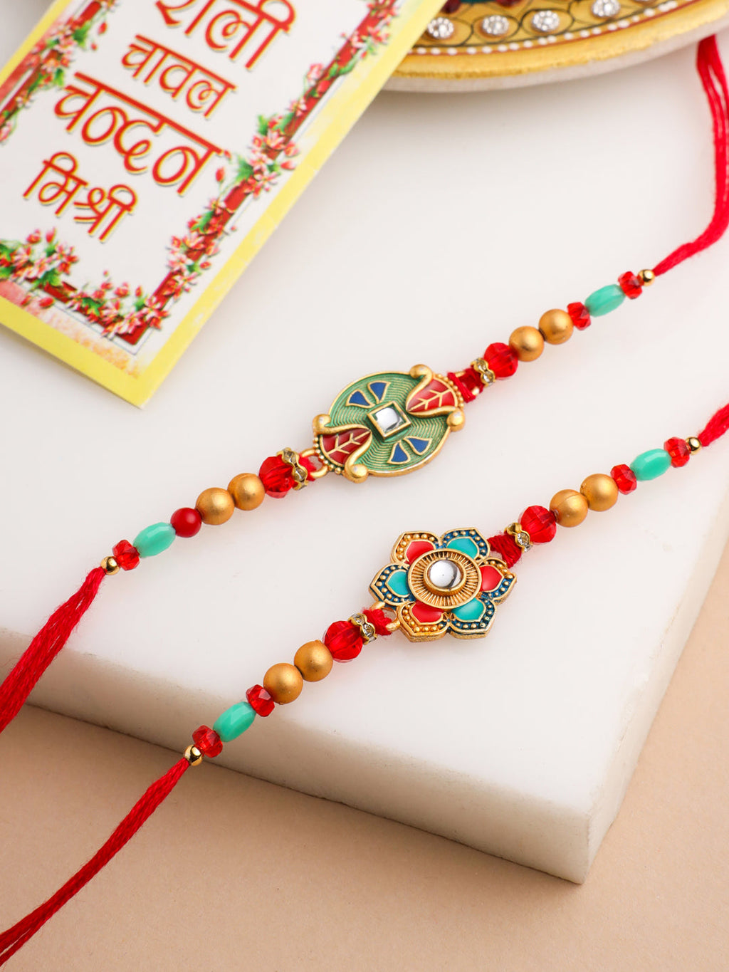 NVR Men Set of 2 Floral Design Red Artificial Stones & Beads Thread Rakhi With Roli Chawal Chandan & Mishri | Grocsy