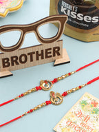 NVR Men Set of 2 Golden Red Religious Designer Ganesh Ji Thread Rakhi Combo | Grocsy