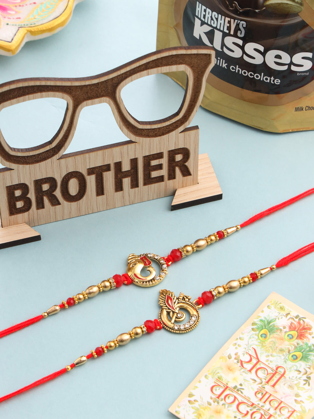 NVR Men Set of 2 Golden Red Religious Designer Ganesh Ji Thread Rakhi Combo | Grocsy
