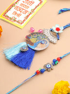NVR Set of 2 Blue Evil Eye & Peacock Design Artificial Beads Bhaiya Bhabhi Rakhi With Roli Chawal Chandan & Mishri | Grocsy