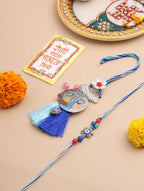 NVR Set of 2 Blue Evil Eye & Peacock Design Artificial Beads Bhaiya Bhabhi Rakhi With Roli Chawal Chandan & Mishri | Grocsy