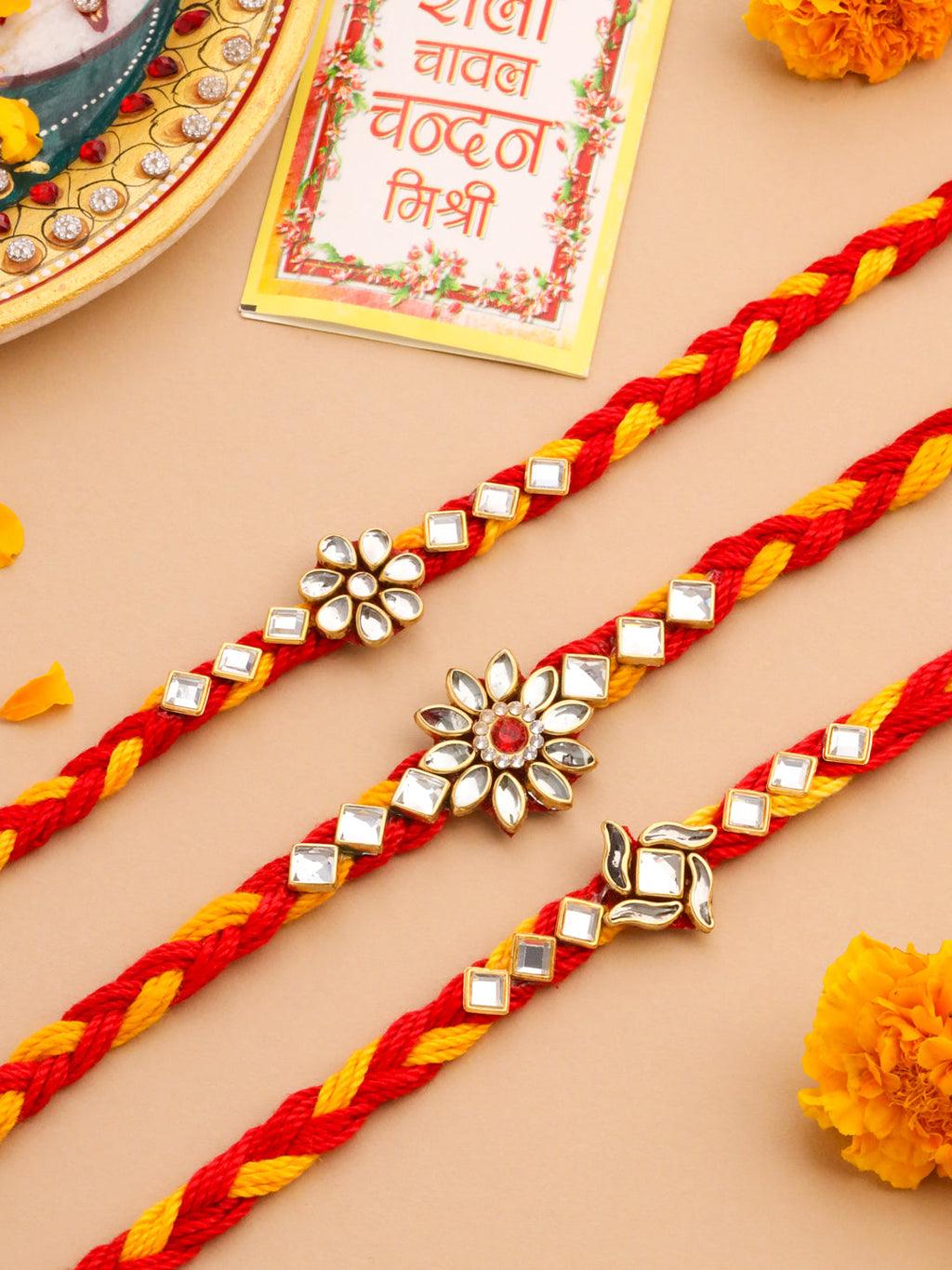 NVR Men Set of 3 Red & Yellow Kundan Studded Floral Design Thread Rakhi with Roli Chawal Chandan & Mishri | Grocsy