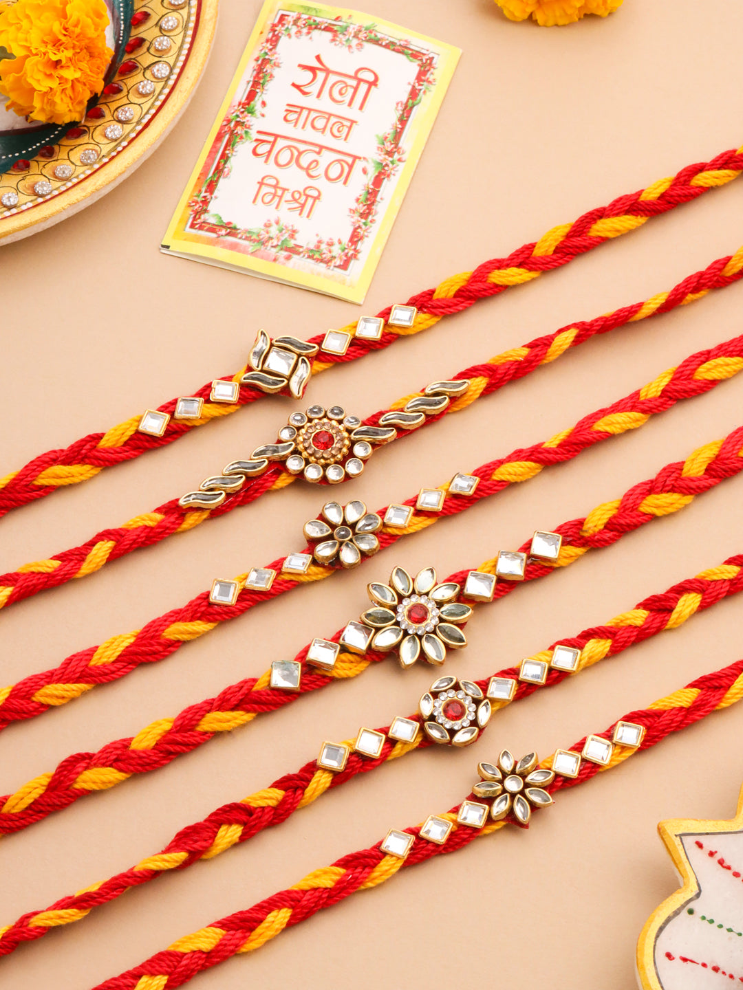 NVR Men Set of 6 Red & Yellow Kundan Studded Floral Design Thread Rakhi with Roli Chawal Chandan & Mishri | Grocsy