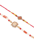 NVR Set of 2 Gold Toned Artificial Stones & Beads Om Design Bhaiya Bhabhi Rakhi with Roli Chawal Chandan & Mishri | Grocsy