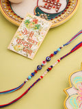 NVR Men Multicolor Evil Eye Artificial Beads Thread Rakhi with Roli Chawal Chandan & Mishri | Grocsy