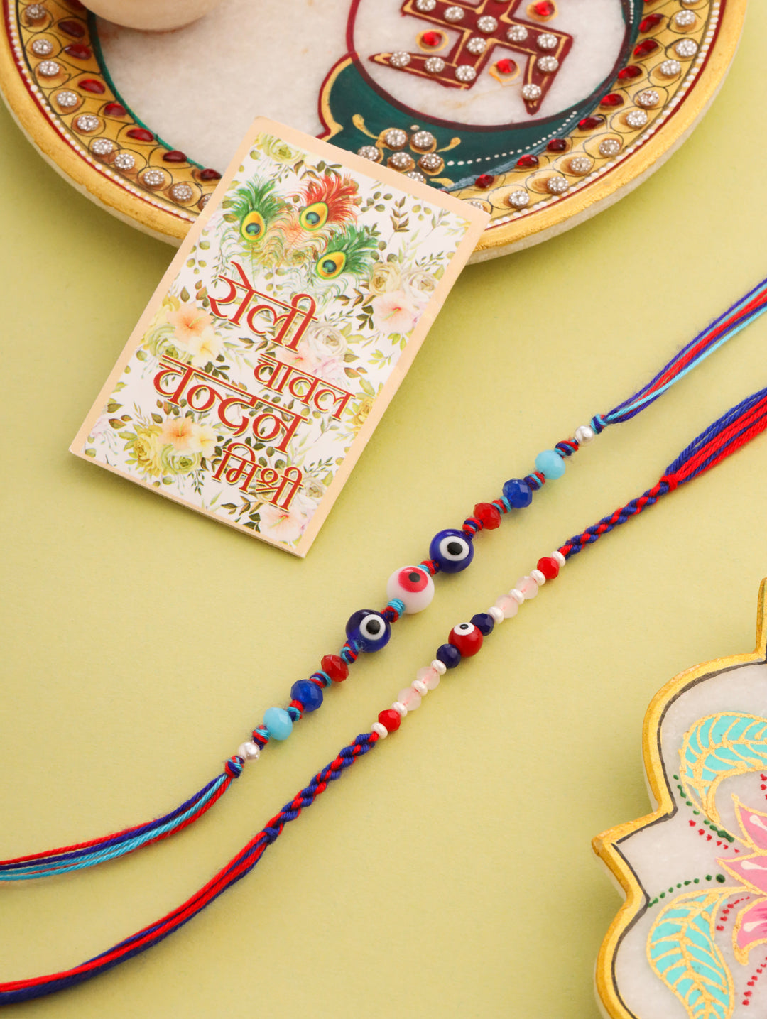 NVR Men Multicolor Evil Eye Artificial Beads Thread Rakhi with Roli Chawal Chandan & Mishri | Grocsy
