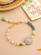 NVR Women Green Artificial Stones & Beads Floral Wraparound Rakhi with Roli Chawal Chandan & Mishri | Grocsy