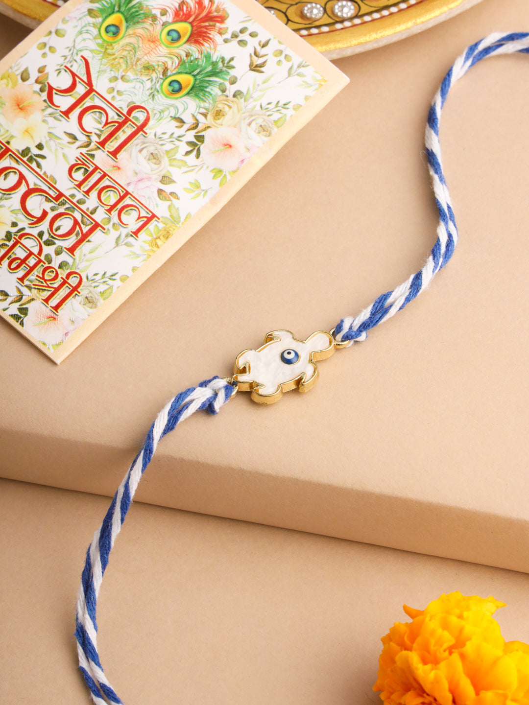 NVR Men Blue Evil Eye Thread Rakhi with Roli Chawal Chandan & Mishri | Grocsy