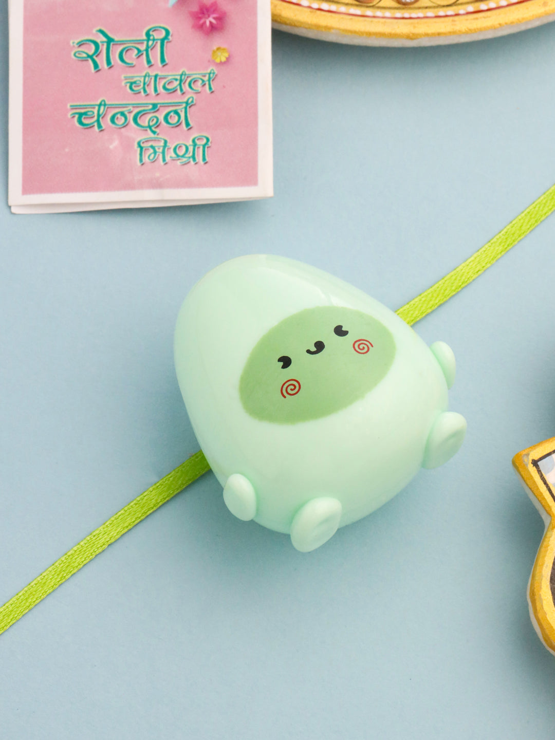 NVR Kids Handmade Green Thread Rakhi with Roli Chawal Chandan & Mishri | Grocsy