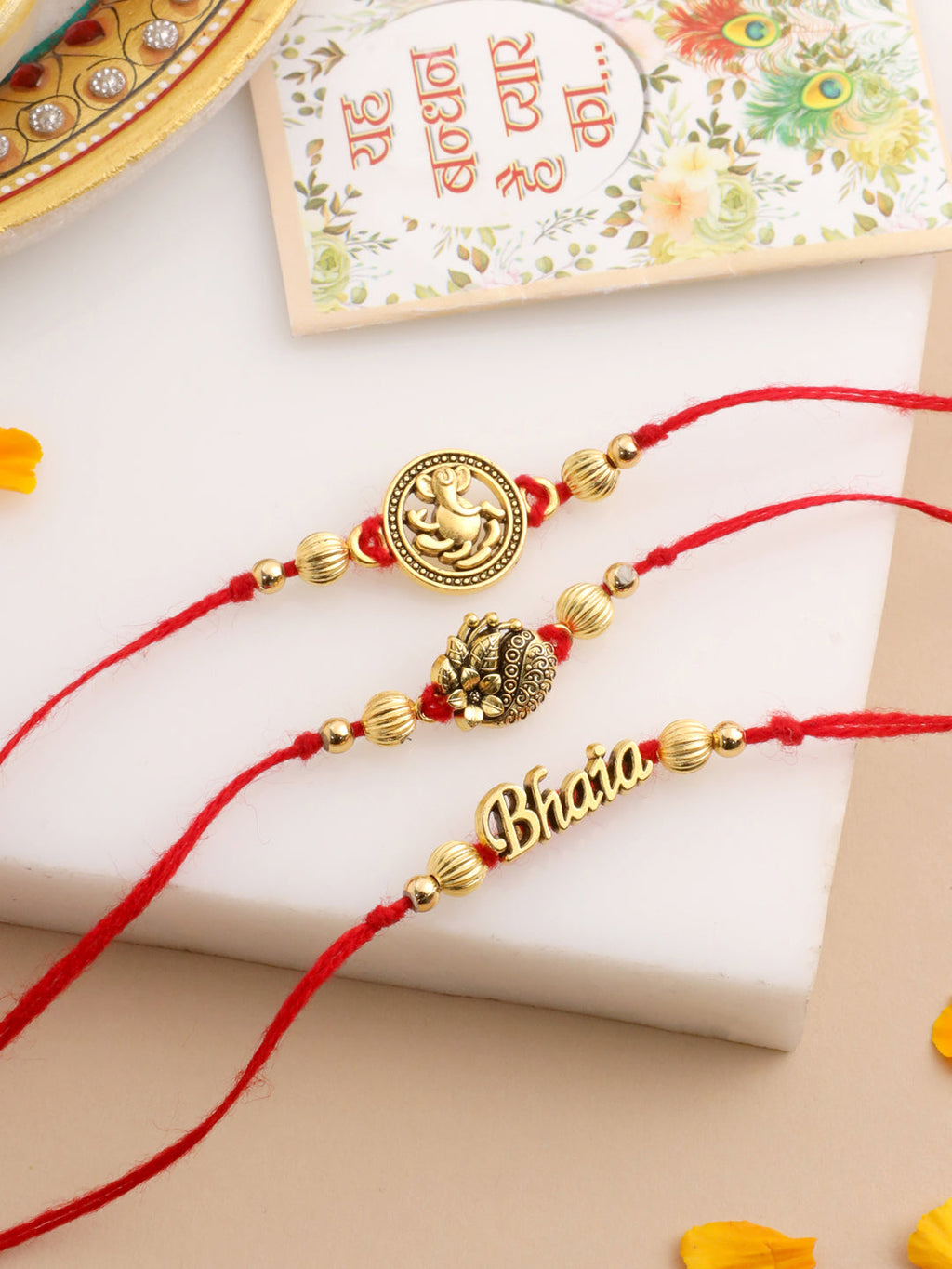 NVR Men Set of 3 Gold Toned Thread Rakhi with Roli Chawal Chandan & Mishri | Grocsy