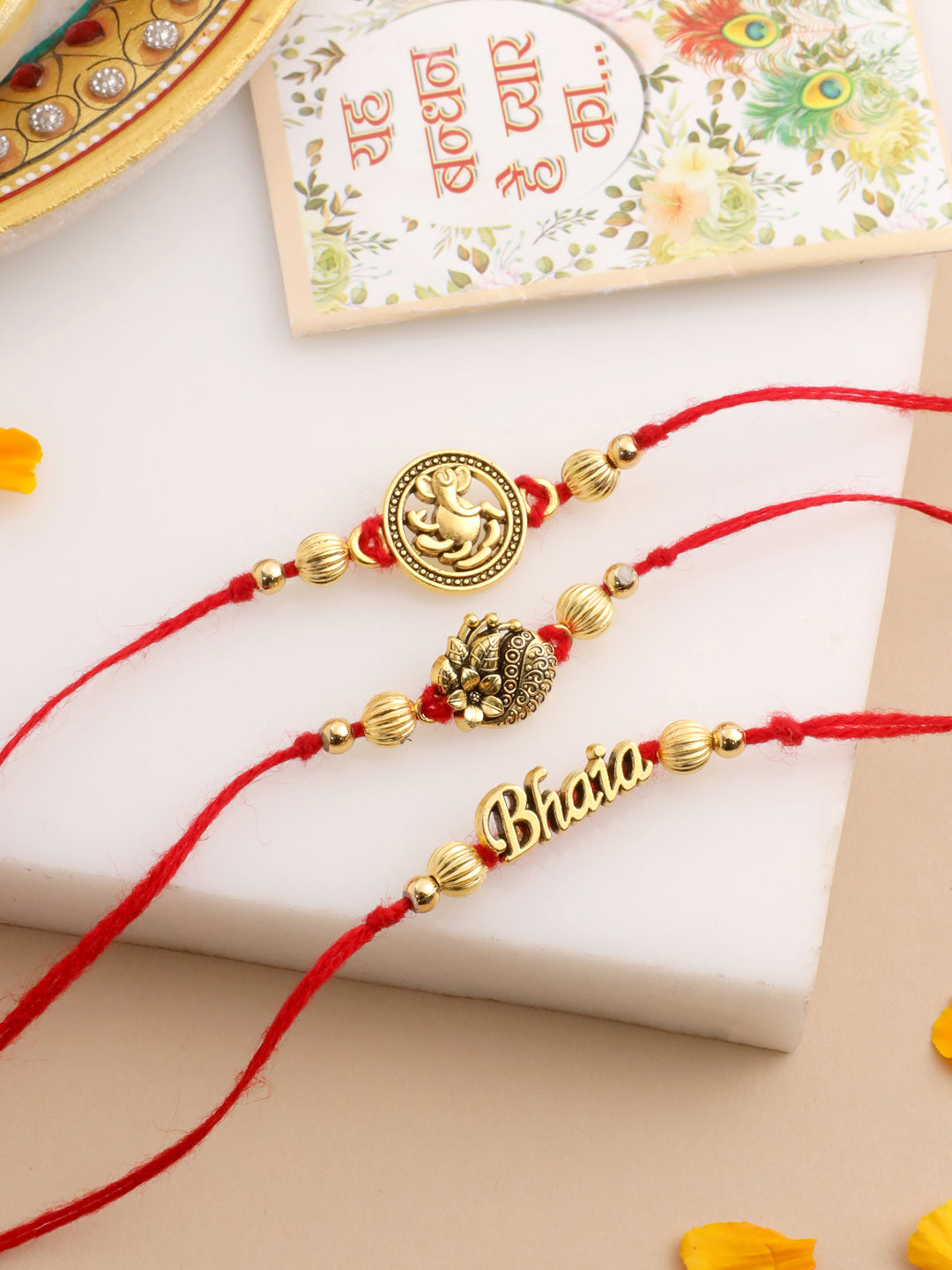 NVR Men Set of 3 Gold Toned Thread Rakhi with Roli Chawal Chandan & Mishri | Grocsy