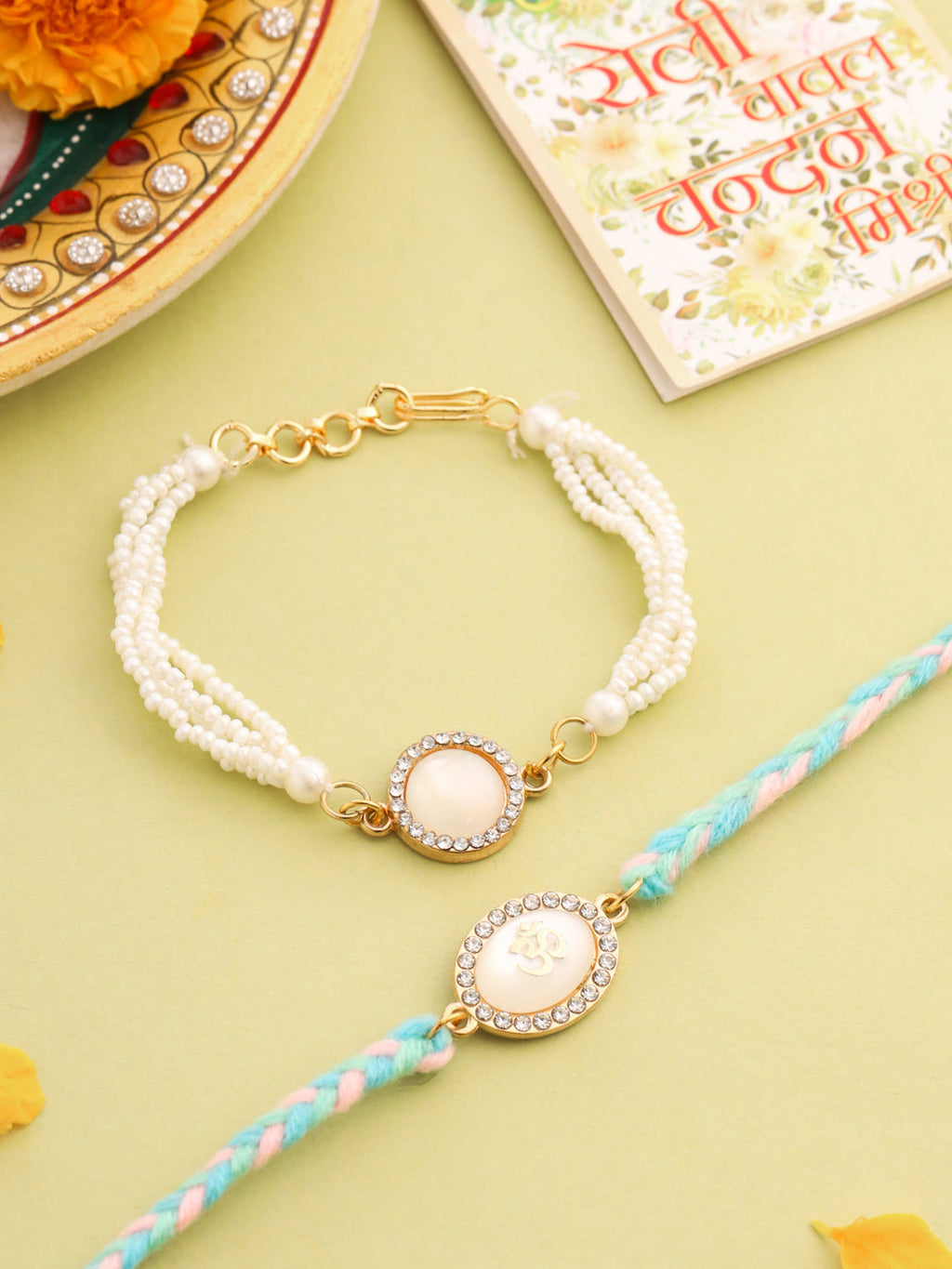 NVR Set of 2 White Pearls & Artificial Beads Bhaiya Bhabhi Rakhi with Roli Chawal Chandan & Mishri | Grocsy